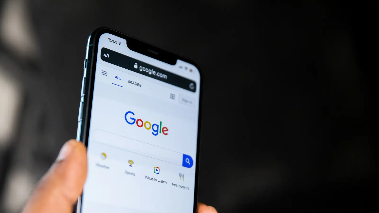 Most local searches start on a phone. Photo by Solen Feyissa on Unsplash
